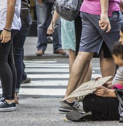 Woman Panhandler Using Child!